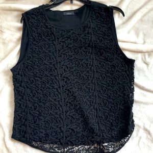 Beautifully detailed lace over cotton tank top